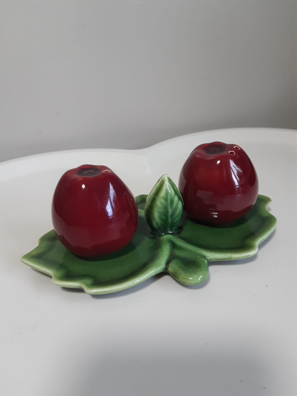 Ceramic Apple Salt and Pepper Shakers on Green Leaf Tray